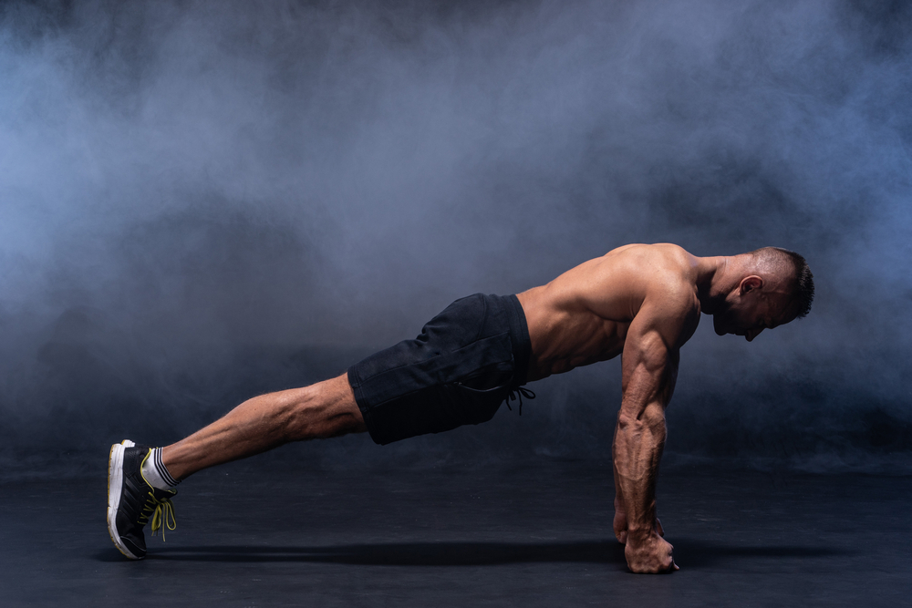 Person doing bodyweight core and leg exercises